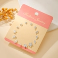 Set of silver-toned mini stud earrings in various shapes like flowers and stars - Silver Leaf Star (E1934-1)