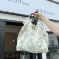 White fringe canvas tote with blue butterfly prints and woven rope handles - Lace Butterfly Cyan
