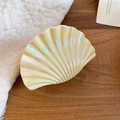 Close-up of iridescent shell-shaped hair claw clip with pearlescent finish - Cream Iridescent Shell Hair Claw (48#) / L / Yellow