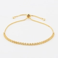 Makroaufnahme des verstellbaren Gold-Bolo-Armbands mit strahlend gelben Zirkonia-Steinen - Gelber Zirkon 2,5 mm Armband
