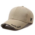 Khaki baseball cap with black embroidered letter M and decorative brim details - Khaki