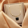 Minimalist gold beaded necklace with square black pendant displayed in a jewelry box - 20#xl1367 - Black Square
