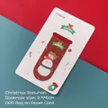Magnet-Lesezeichen in Dunkelrot mit Schneemann- und Elch-Mädchen-Motiv, Format 2,5x6cm - Schneemann
