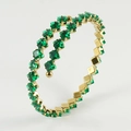 Vintage 18k gold spiral open bangle with emerald-green zircon and square-cut stones - Emerald Green Zirconia
