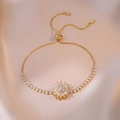 Adjustable gold sunflower bolo bracelet with white cubic zirconia pavé setting - Gold Sunflower Bracelet (TS0194) / Gold