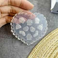Transparent heart silicone mold with winter theme silver hat and sweater nail charms - #006 Winter Sweater Socks Heart Mold