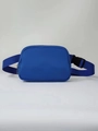 Waterproof athletic fanny pack in solid blue fabric with adjustable strap and buckle - Blue