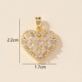 Detailed size view of a gold heart pendant with cubic zirconia, 2.2cm by 1.7cm - 0228-13/Gold Square Zirconia