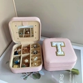 Pink portable jewelry box with mirror and white towel embroidered letter T on top - Letter T / Pink