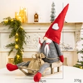 58cm Christmas gnome plush with red pointed hat, grey body, and wooden sled decoration - Sled Gnome Female