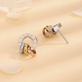 Three-tone interlocking roman numeral earrings in gold, silver and rose gold finish - Three-color Ring - Silver