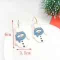Detail view of handmade clay snowman earrings measuring 6cm by 3.5cm for Christmas - Blue Hat Orange Nose Snowman