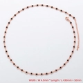Detail view of 4.5mm width station necklace with black zircons and extension chain - Necklace / Rose Gold / Black Zirconia