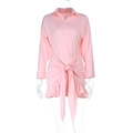 Detail of pink long sleeve shirt dress showing waist tie-knot and ruffled hemline - S / Light Pink