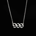 Macro shot of silver 999 angel number pendant on O-chain with hip-hop style - 999 Steel