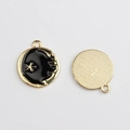 Detail of star and moon charms showing black enamel face front and textured back - Black Star