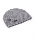 Detailed knit texture of a grey beanie featuring two handcrafted crochet floral accents - One Size / Gray