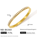 Detail shot of golden stainless steel bracelet showing 5mm width and 61mm inner diameter - Pave Set Bangle (NB-B6360)