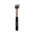 Macro detail of soft angled foundation brush with synthetic bristles and black handle - Black & Gold