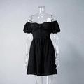 Detail of off-shoulder black dress with tie-up bow neckline and puffy short sleeves - S / Black