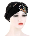 Turban noir avec bandeau tressé à motif floral coloré et détail croisé devant - Patchwork Noir Fleuri