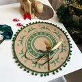 Jute Christmas placemat with green reindeer print and pom-pom trim on festive table - Style 3 Green (Pom-poms)