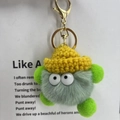 Cute green plush coal ball keychain with yellow knit hat and golden metal clip - Light Green