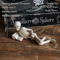 Nordic resin skeleton reading figurine in beige finish with vintage texture for shelf decor - Skeleton Side Pose Reading A556-0007
