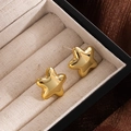 Minimalist gold star stud earrings with mirror polished finish on beige linen tray - Gold Five-pointed Star
