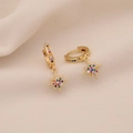Detail of gold-plated hoop earrings with multicolor micro-set zircon star charms - Eight-pointed Star Style