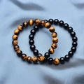 Brown tiger eye and black obsidian beaded bracelets for men with glossy round stones - Tiger Eye + Polished Stone / Brown/Black