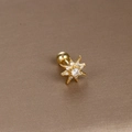 Macro shot of gold star cartilage piercing stud with round zircon and screw back - Gold White Zirconia (Eight-Pointed Star)