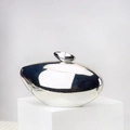 Silver metallic pebble-shaped evening clutch bag on a minimalist white pedestal - 21*6.5*13 / Silver