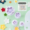 Set of 4 lavender plastic flower cookie stamps with spring plungers in various sizes - Five-Petal Flower Spring Press Mold 4-Piece Set
