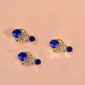Golden alloy nail art charm with deep blue gemstones and sparkling crystal rhinestones - Gold Base Blue Gemstone Pendant Piece