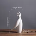 Figurine humaine abstraite en céramique mate blanche, pose double bras, 29,5 cm - Deux bras levés / HP329