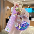 Lila Bubble Tea Bär Schlüsselanhänger mit flüssigem Sand und Hasenanhänger - Lila