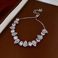 Detail of silver vintage floral bracelet with teardrop diamonds and adjustable drawstring clasp - 23# Bracelet - Silver - White