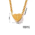 Delicate gold heart pendant necklace featuring an engraved letter T on an O-chain - Letter-T