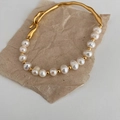 Elegant gold wave bracelet with white pearls and vintage metallic accents on paper - Vintage Wave Artificial Pearl Splicing (SL1244)