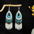 Bohemian silver ethnic earrings featuring blue enamel teardrops and metal feathers - Blue