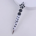 Detail of DIY beaded pen featuring a 3D cat paw charm and printed black plastic body - Dog Paw Black
