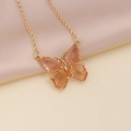Detailed view of butterfly pendant necklace with translucent orange crystals on silk - 7# Peach Necklace