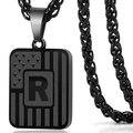 Macro shot of gun-black titanium steel letter R pendant with American flag texture - Letter R
