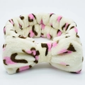 Beige plush leopard print headband with a pink bow for washing face and makeup - Pink and White Leopard Print