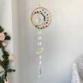 Golden crescent moon crystal suncatcher with black beads and a faceted crystal ball - Obsidian