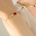 Golden snake chain bracelet and necklace set featuring a square red zircon gemstone - Red Zirconia Gold Bracelet (E377)