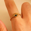 Close-up of golden evil eye ring with black pupil and embossed diamond pattern details - 18k Gold Plated (0023)