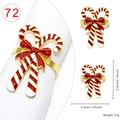Christmas candy cane napkin ring with red bow and gold trim details for table decor - Double Candy Cane Style 72