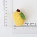 Handmade crochet yellow mango charm keychain with green leaf and brown stem detail - Combed Cotton Knitted Mango